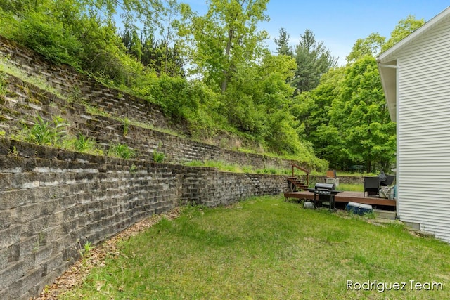 4160 Knapp Valley Dr NE, Grand Rapids, MI 49525 - view of grassy yard with a wooden deck