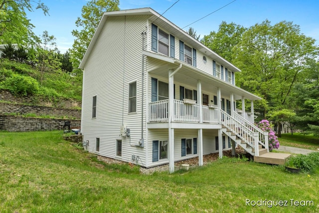 4160 Knapp Valley Dr NE, Grand Rapids, MI 49525 - view of home's exterior with a lawn and covered porch