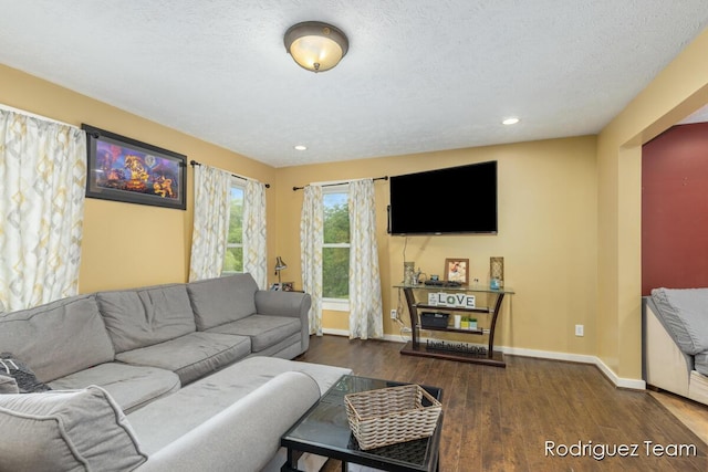 4160 Knapp Valley Dr NE, Grand Rapids, MI 49525 - living room featuring wood finished floors, baseboards, and recessed lighting