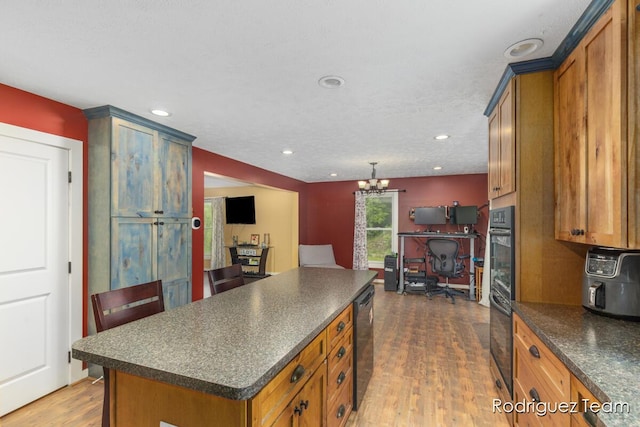 4160 Knapp Valley Dr NE, Grand Rapids, MI 49525 - kitchen with dark countertops, dishwasher, brown cabinets, and recessed lighting