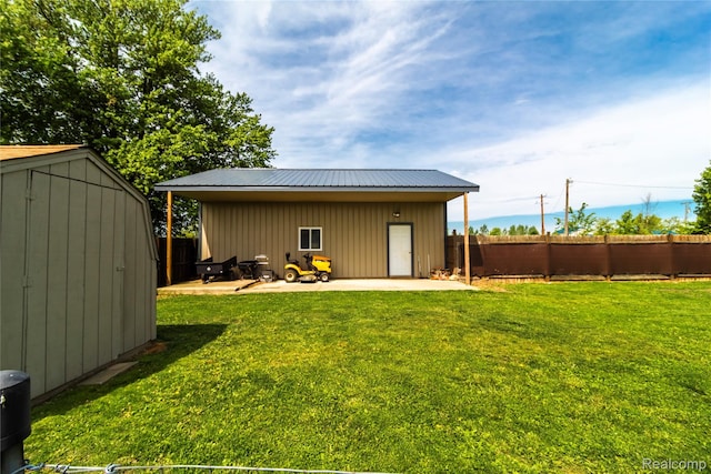 2254 Wheeling Rd, Imlay City, MI 48444 - rear view of property with a patio, board and batten siding, and metal roof