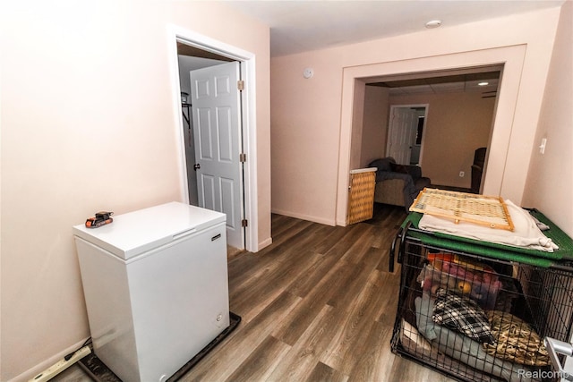 2254 Wheeling Rd, Imlay City, MI 48444 - hallway with dark wood-type flooring and baseboards