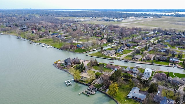 28220 Swan Island Dr, Grosse Ile, MI 48138 - aerial overview of property's location with a nearby body of water and nearby suburban area