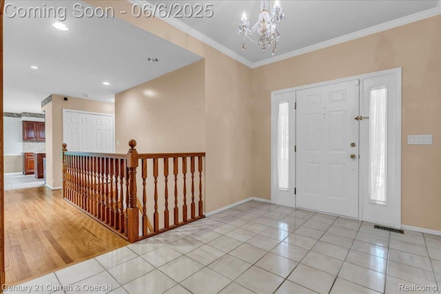 2198 Pine Hollow Trl, Brighton, MI 48114 - foyer entrance featuring a chandelier, ornamental molding, baseboards, light tile patterned flooring, and recessed lighting