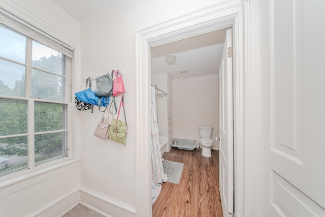 414 W Summit St, Ann Arbor, MI 48103 - bathroom featuring toilet, wood finished floors, curtained shower, and baseboards