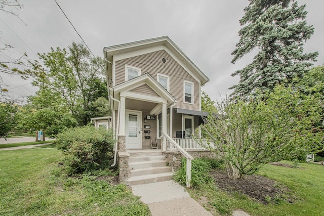 414 W Summit St, Ann Arbor, MI 48103 - view of front of property with covered porch and a front lawn