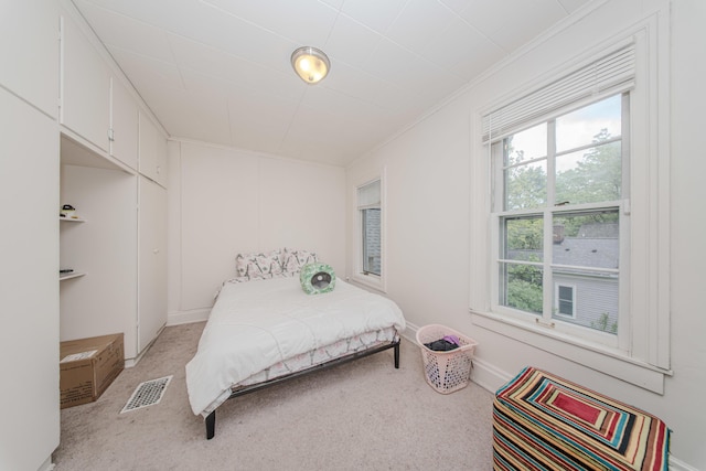 414 W Summit St, Ann Arbor, MI 48103 - bedroom with ornamental molding, light colored carpet, and baseboards