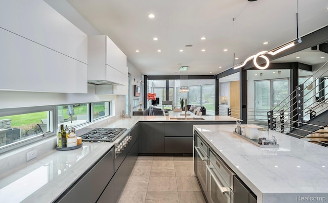 1363 Forest Bay Dr, Waterford, MI 48328 - kitchen featuring modern cabinets, recessed lighting, light stone counters, white cabinets, and stainless steel gas cooktop