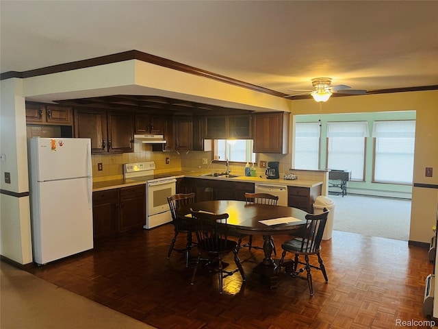 14924 Hough Rd, Allenton, MI 48002 - kitchen featuring white appliances, a sink, light countertops, dark brown cabinets, and ornamental molding