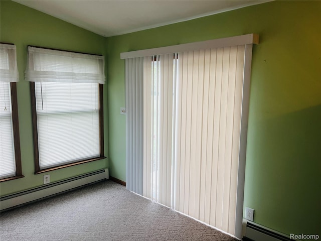 14924 Hough Rd, Allenton, MI 48002 - empty room with baseboard heating, healthy amount of natural light, and carpet floors