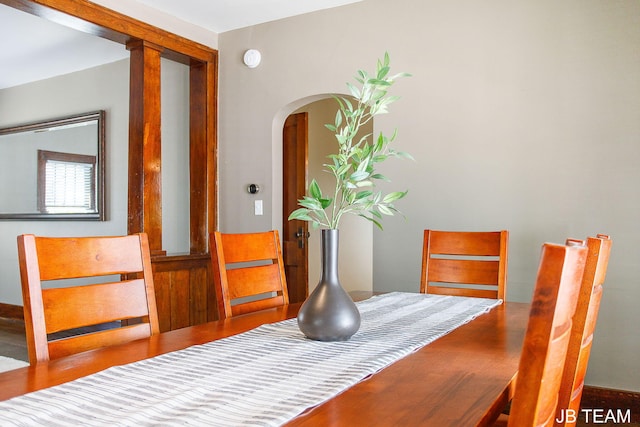 200 W 21st St, Holland, MI 49423 - dining area featuring arched walkways and wood finished floors
