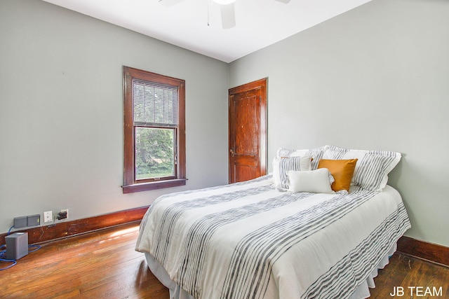 200 W 21st St, Holland, MI 49423 - bedroom featuring baseboards, hardwood / wood-style floors, and ceiling fan