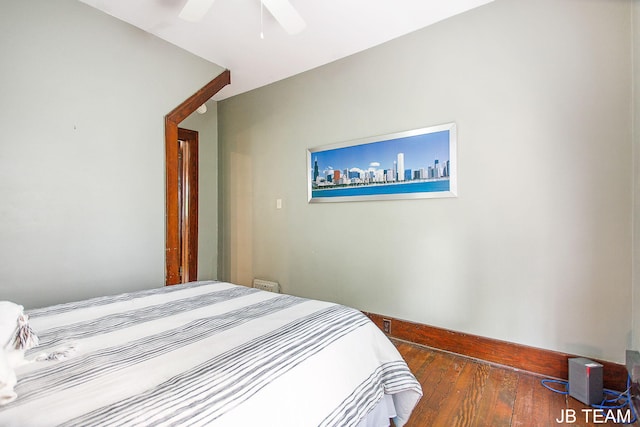 200 W 21st St, Holland, MI 49423 - bedroom with wood-type flooring, baseboards, and ceiling fan