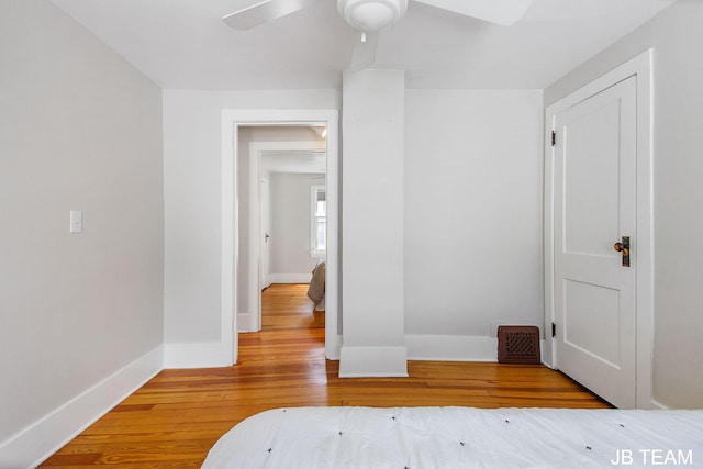 200 W 21st St, Holland, MI 49423 - bedroom featuring hardwood / wood-style flooring, baseboards, and ceiling fan