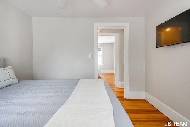 200 W 21st St, Holland, MI 49423 - bedroom featuring wood finished floors, baseboards, and ceiling fan