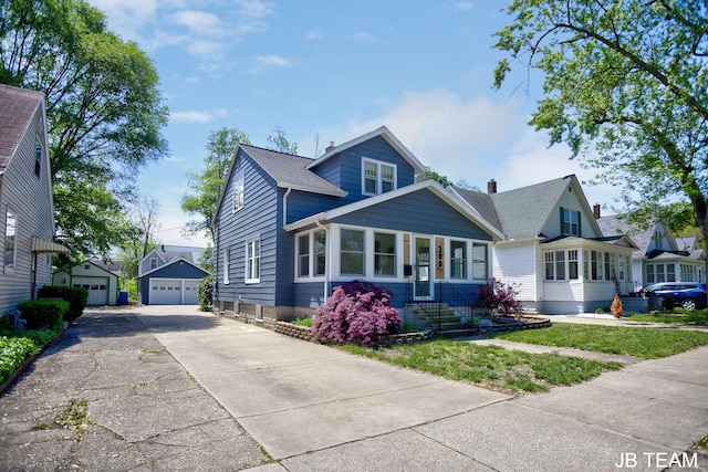 200 W 21st St, Holland, MI 49423 - view of front facade with a garage and an outdoor structure
