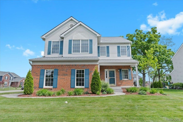 1132 Cantor Ln, South Lyon, MI 48178 - view of front facade featuring brick siding, a front lawn, and covered porch