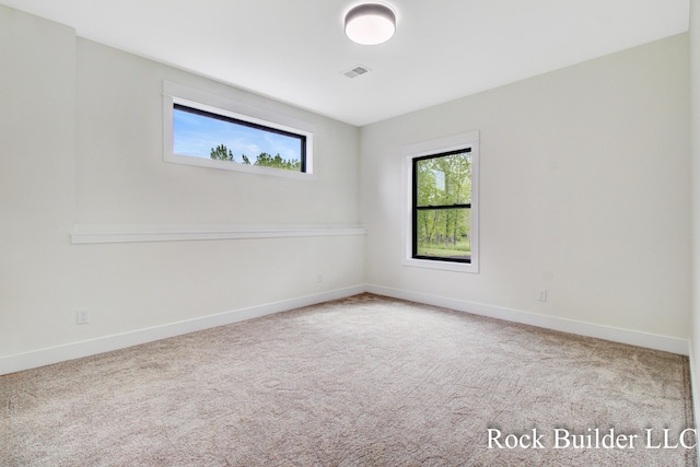 7134 Sugar Maple Dr, Hudsonville, MI 49426 - carpeted empty room featuring baseboards