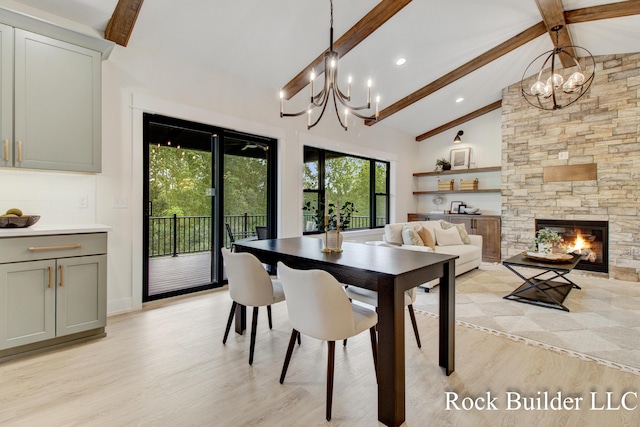7134 Sugar Maple Dr, Hudsonville, MI 49426 - dining area with a chandelier, beamed ceiling, light wood-type flooring, a stone fireplace, and recessed lighting