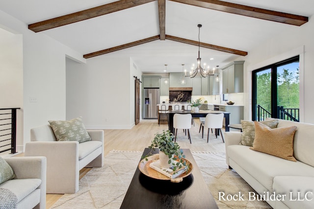 7134 Sugar Maple Dr, Hudsonville, MI 49426 - living room featuring a chandelier, light wood finished floors, and baseboards