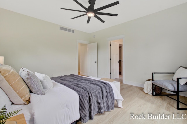 7134 Sugar Maple Dr, Hudsonville, MI 49426 - bedroom with wood finished floors, baseboards, and a ceiling fan