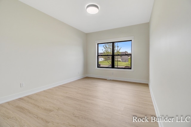 7134 Sugar Maple Dr, Hudsonville, MI 49426 - unfurnished room with light wood-type flooring and baseboards