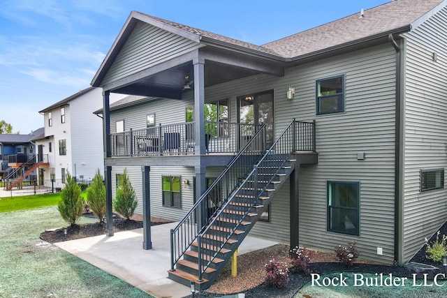7134 Sugar Maple Dr, Hudsonville, MI 49426 - back of property featuring a patio area and stairs