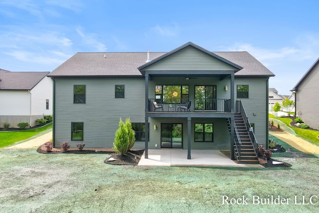 7134 Sugar Maple Dr, Hudsonville, MI 49426 - rear view of house with a patio, a balcony, stairs, and a yard