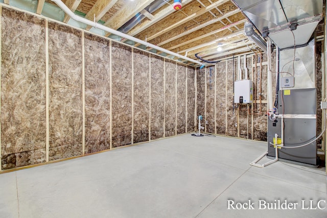 7134 Sugar Maple Dr, Hudsonville, MI 49426 - unfinished basement featuring tankless water heater