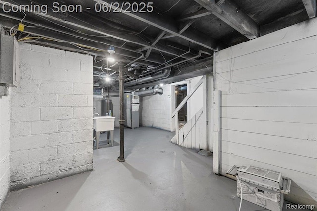 18697 Sunderland Rd, Detroit, MI 48219 - below grade area with water heater, heating unit, and stairs