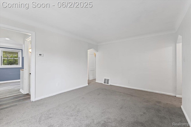 18697 Sunderland Rd, Detroit, MI 48219 - unfurnished room with baseboards and carpet flooring