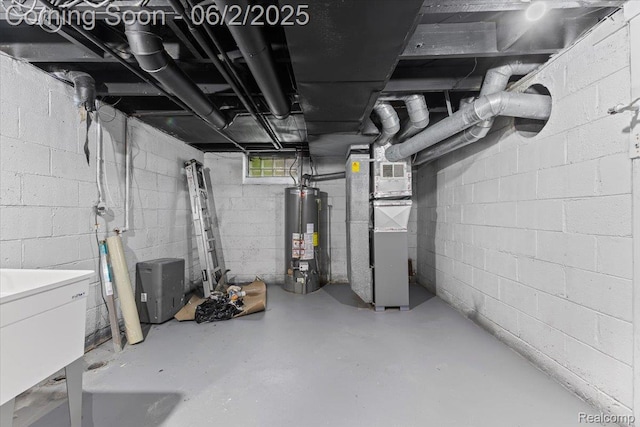 18697 Sunderland Rd, Detroit, MI 48219 - below grade area featuring water heater and heating unit