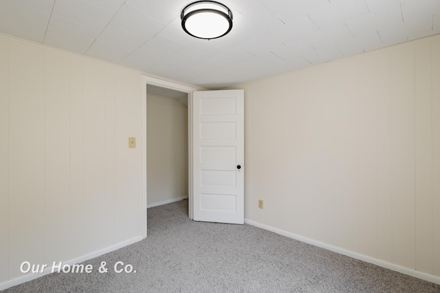 337 N Fairview Ave, Lansing, MI 48912 - carpeted empty room featuring baseboards