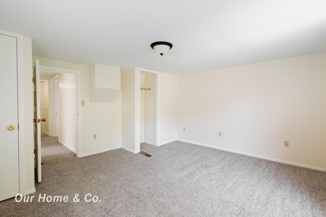 337 N Fairview Ave, Lansing, MI 48912 - unfurnished bedroom featuring carpet floors, baseboards, and a closet