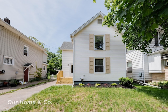 337 N Fairview Ave, Lansing, MI 48912 - view of front facade featuring a front lawn