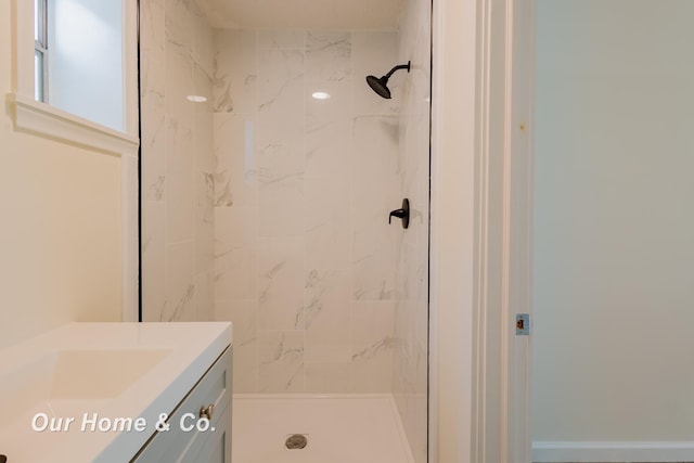 337 N Fairview Ave, Lansing, MI 48912 - bathroom featuring vanity and tiled shower