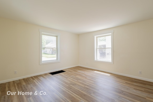 337 N Fairview Ave, Lansing, MI 48912 - unfurnished room with wood finished floors and baseboards