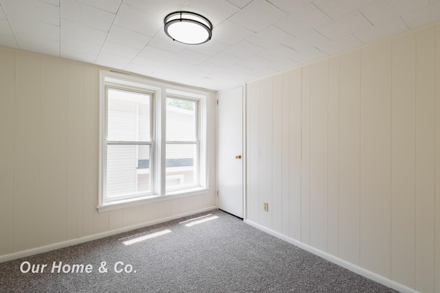 337 N Fairview Ave, Lansing, MI 48912 - carpeted spare room with a decorative wall and baseboards