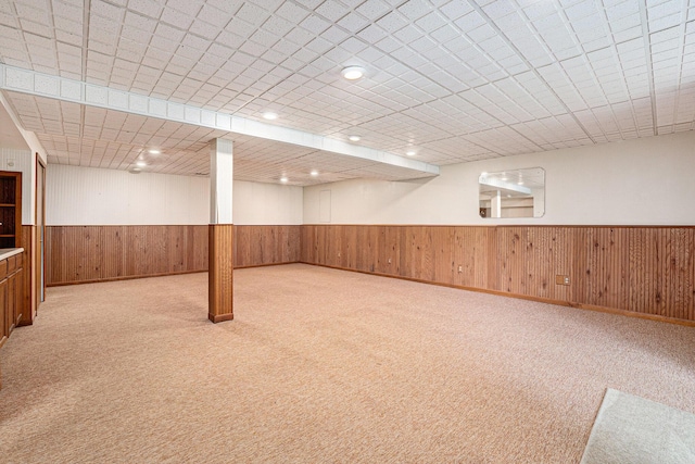 6400 Chestnut Hill Ct, Clarkston, MI 48346 - finished basement with wainscoting, light colored carpet, and wood walls