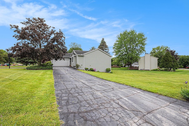 6400 Chestnut Hill Ct, Clarkston, MI 48346 - view of front of home with a garage, asphalt driveway, and a front lawn