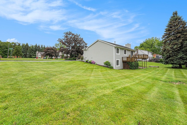 6400 Chestnut Hill Ct, Clarkston, MI 48346 - view of green lawn featuring a deck