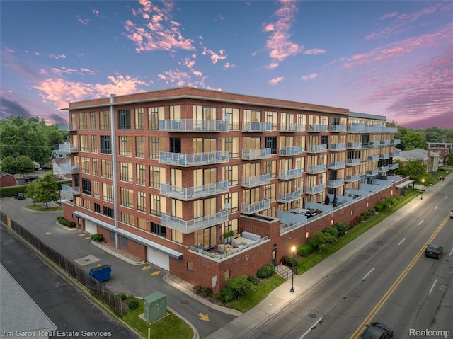 101 Curry Ave Unit 530, Royal Oak, MI 48067 - property at dusk featuring a view of apartment building / complex