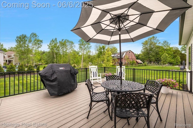 6231 Leighland Dr, Grand Blanc, MI 48439 - wooden deck with outdoor dining space, area for grilling, and a lawn