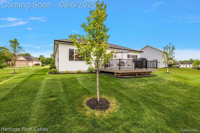 6231 Leighland Dr, Grand Blanc, MI 48439 - back of house with a deck and a yard