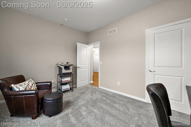 6231 Leighland Dr, Grand Blanc, MI 48439 - living area featuring carpet flooring, baseboards, and a desk