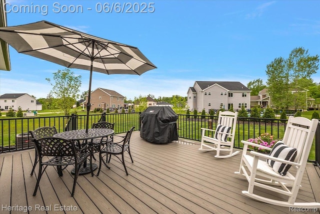 6231 Leighland Dr, Grand Blanc, MI 48439 - deck featuring outdoor dining area, a residential view, and a grill
