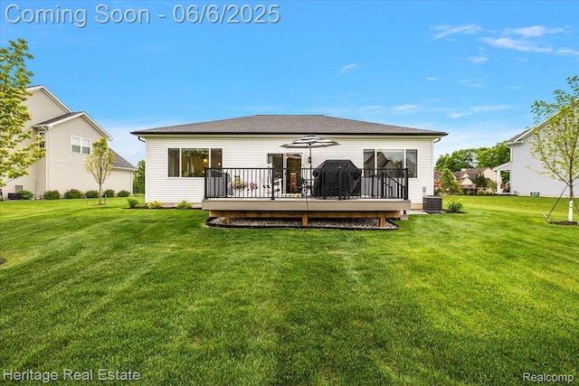6231 Leighland Dr, Grand Blanc, MI 48439 - back of property featuring a wooden deck, a yard, and central AC unit