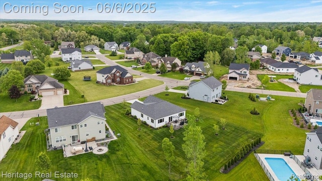 6231 Leighland Dr, Grand Blanc, MI 48439 - aerial view of residential area featuring a pool area