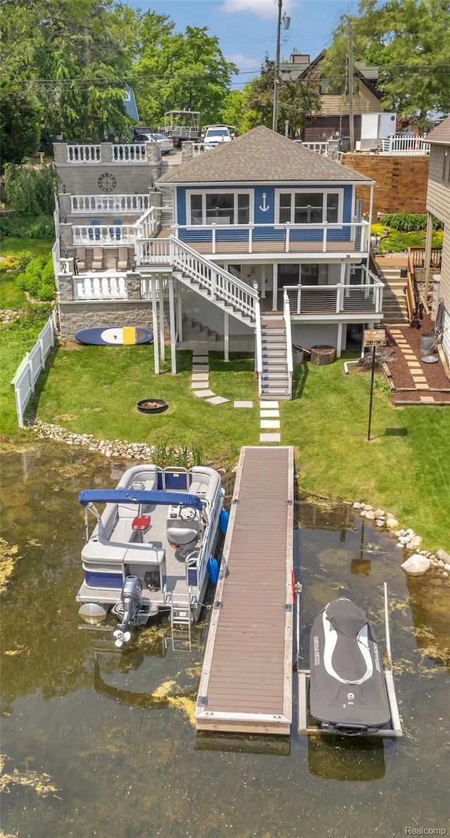 533 Bellevue Ave, Lake Orion, MI 48362 - back of property with roof with shingles, stairway, a lawn, a balcony, and a water view
