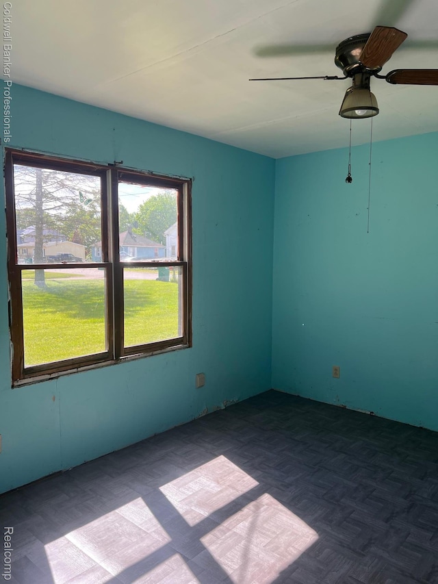 158 W Willow St, Perry, MI 48872 - spare room featuring plenty of natural light and a ceiling fan
